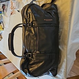Black leather duffle bag